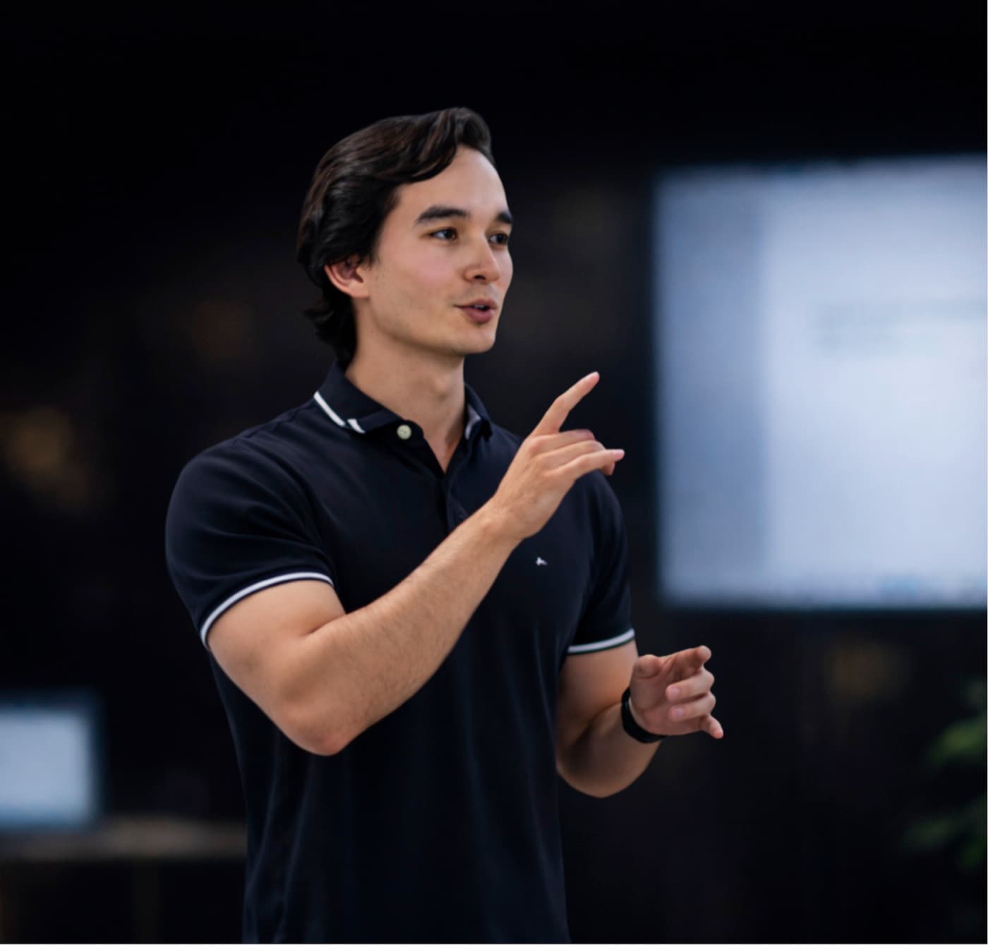 Hayden Anderson mid-sentence, walking a room through a sales process